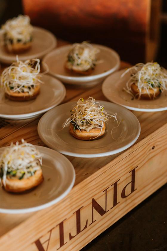Tray of canapes on a wooden board
